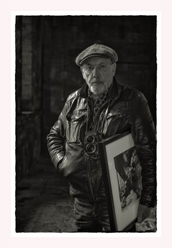 Portrait of photographer John Minihan